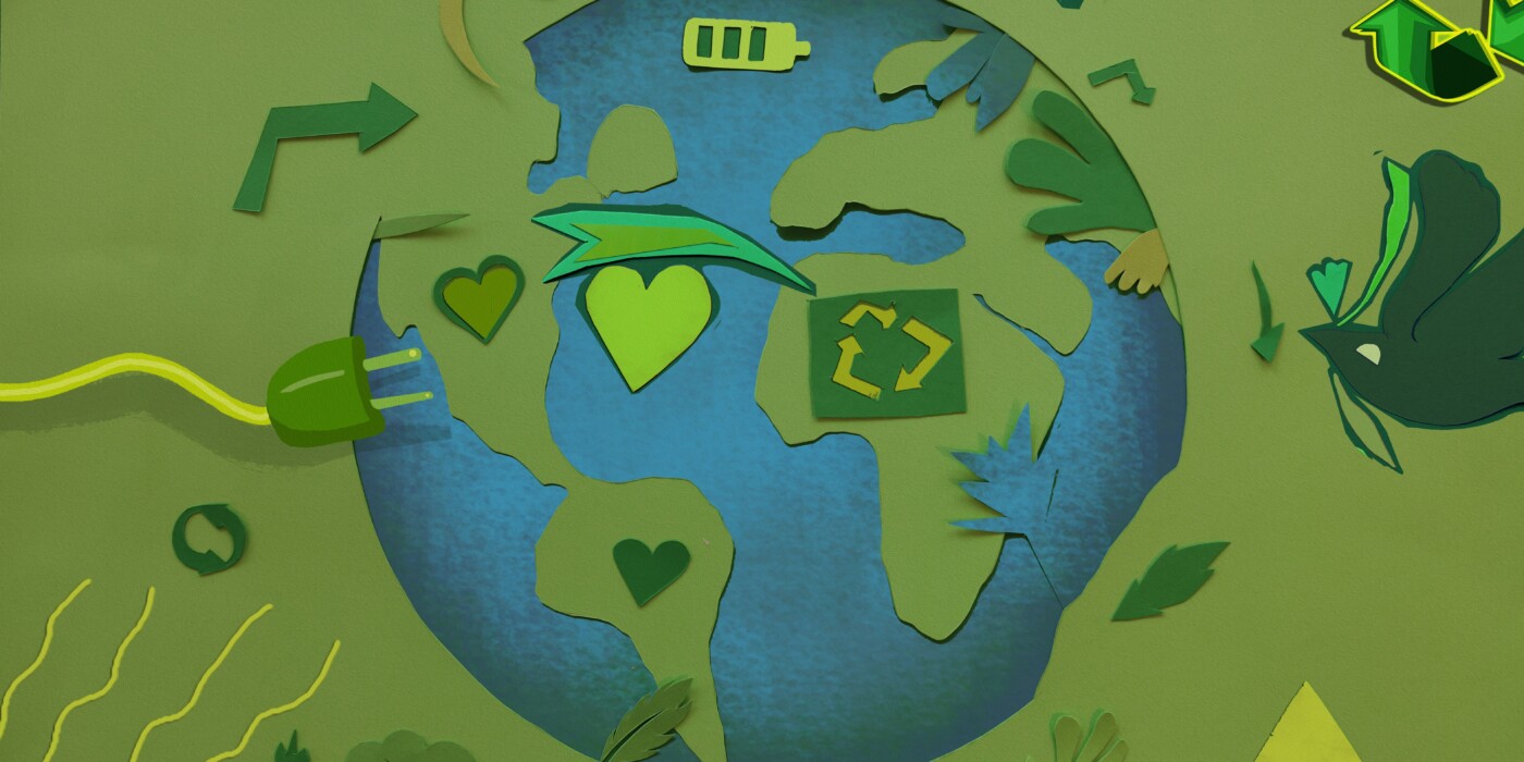 Collage papier représentant la terre avec , tout autour, des symboles de l'économie d'énergie