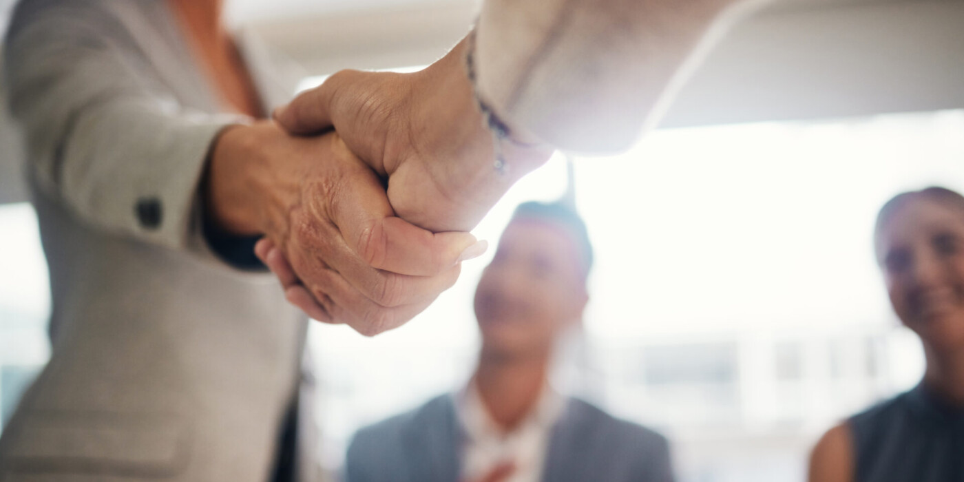 Handshake, hiring and contract with people in office for collaboration, teamwork and thank you.